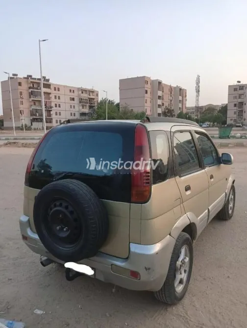 دايهاتسو تيريوس 1999 ذهبي مستعملة للبيع - 4