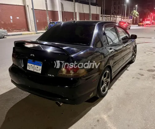 ميتسوبيشي لانسر 2007 أسود مستعملة للبيع - 7