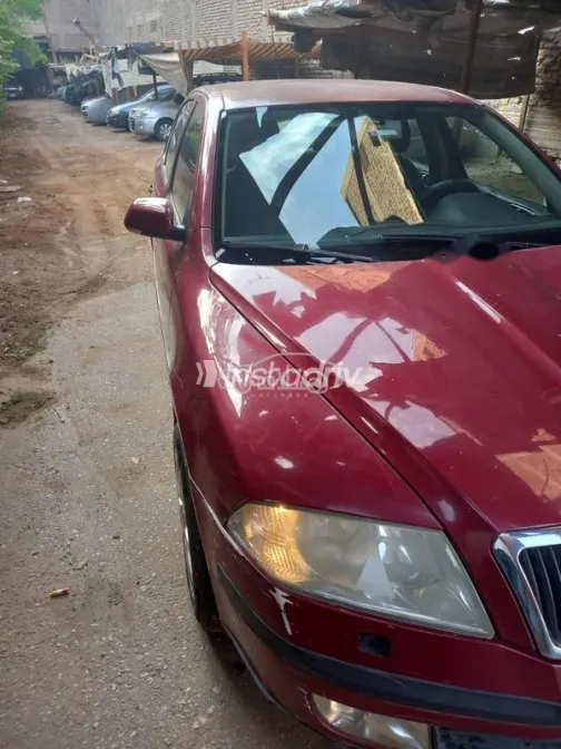 سكودا اوكتافيا A5 2005 أحمر غامق مستعملة للبيع - 9