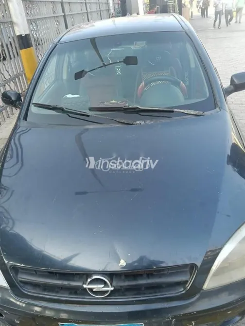 اوبل كورسا 2003 أزرق غامق مستعملة للبيع - 1