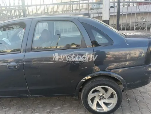 اوبل كورسا 2003 أزرق غامق مستعملة للبيع - 9