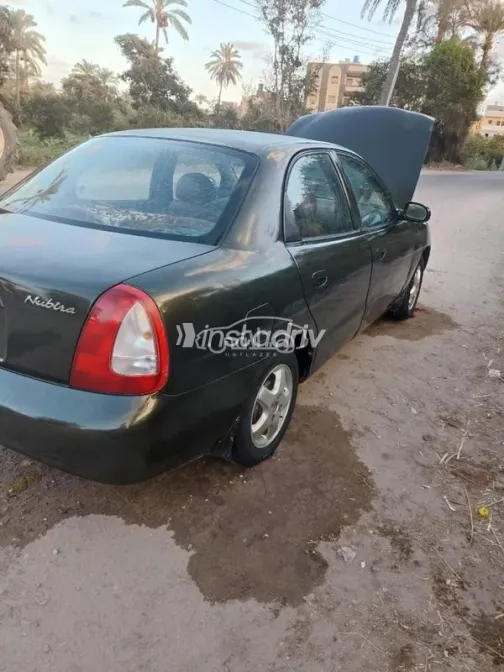 دايو نوبيرا 1 1997 أخضر غامق مستعملة للبيع - 1