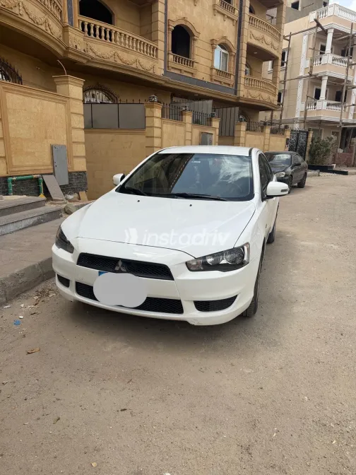 ميتسوبيشي لانسر 2015 أبيض مستعملة للبيع - 5