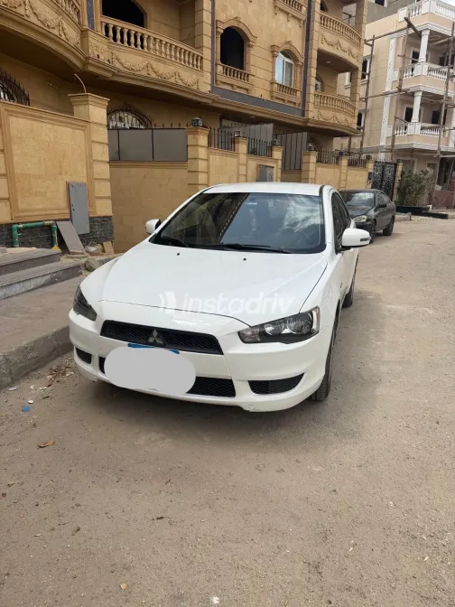ميتسوبيشي لانسر 2015 أبيض مستعملة للبيع - 6