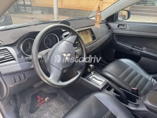 ميتسوبيشي لانسر 2015 أبيض مستعملة للبيع - 7