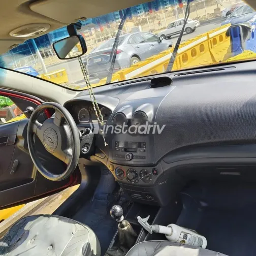 شيفروليه افيو 2009 أحمر غامق مستعملة للبيع - 3