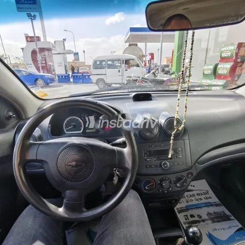 شيفروليه افيو 2009 أحمر غامق مستعملة للبيع - 5