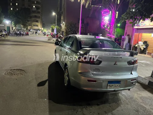 ميتسوبيشي لانسر 2015 أبيض مستعملة للبيع - 3