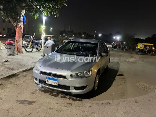 ميتسوبيشي لانسر 2015 أبيض مستعملة للبيع - 6