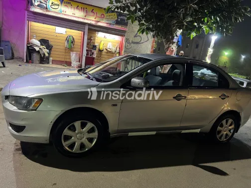 ميتسوبيشي لانسر 2015 أبيض مستعملة للبيع - 7