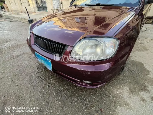 هيونداي فيرنا 2013 أحمر غامق مستعملة للبيع - 5