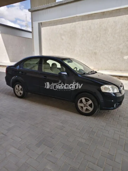 شيفروليه افيو 2010 أسود مستعملة للبيع - 2