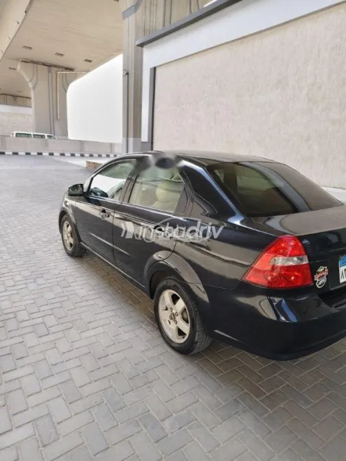 شيفروليه افيو 2010 أسود مستعملة للبيع - 3