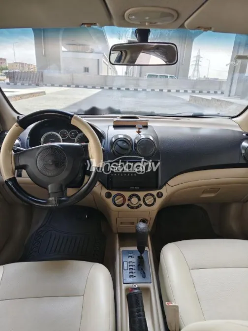 شيفروليه افيو 2010 أسود مستعملة للبيع - 7