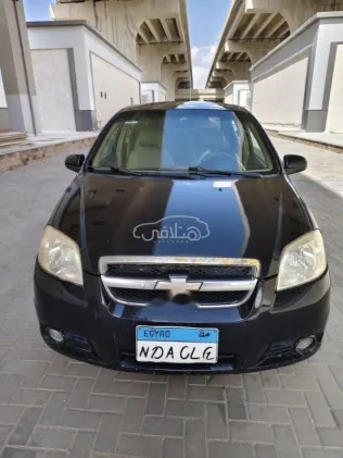 شيفروليه افيو 2010 أسود مستعملة للبيع