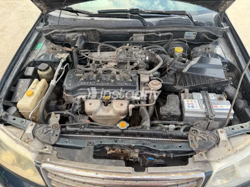 نيسان صنى 2007 أبيض مستعملة للبيع - 2