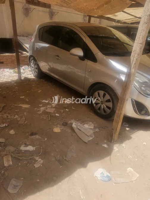 اوبل كورسا 2013 أبيض مستعملة للبيع - 1