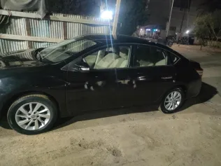 نيسان سنترا 2021 أبيض مستعملة للبيع