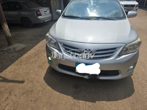 تويوتا كورولا 2012 فضي مستعملة للبيع - 1