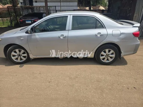 تويوتا كورولا 2012 فضي مستعملة للبيع - 7