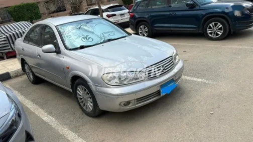 نيسان صنى 2008 فضي مستعملة للبيع - 4
