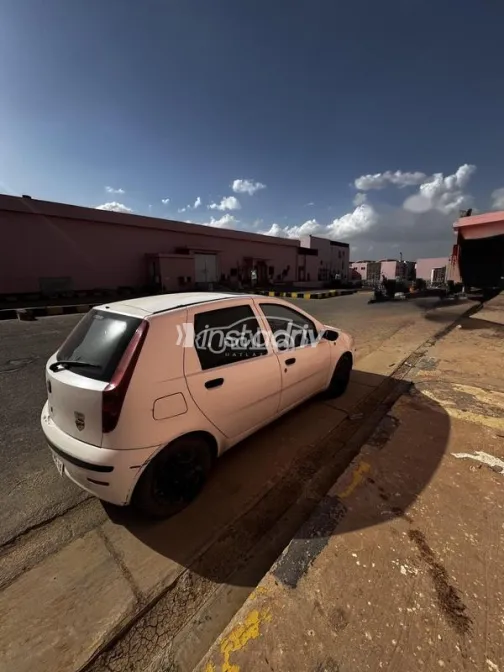 فيات بونتو 2006 أبيض مستعملة للبيع - 4