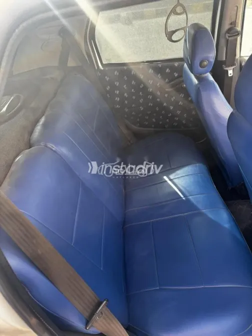 فيات بونتو 2006 أبيض مستعملة للبيع - 7