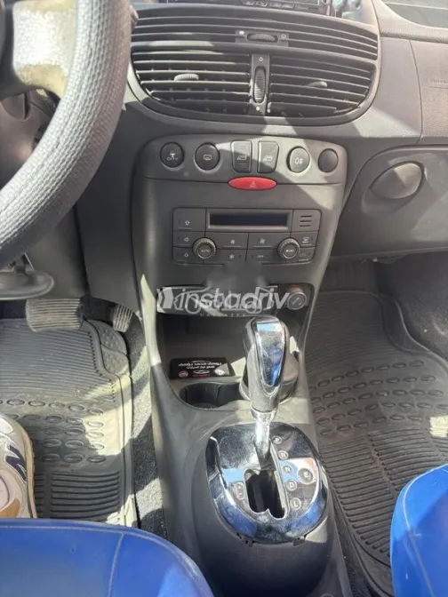 فيات بونتو 2006 أبيض مستعملة للبيع - 8