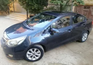 كيا ريو 2013 أزرق غامق مستعملة للبيع