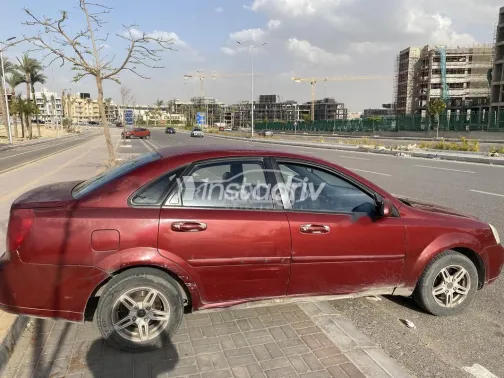 شيفروليه أوبترا 2007 أحمر مستعملة للبيع - 4