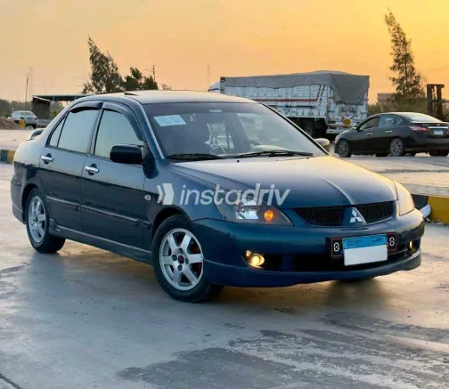 ميتسوبيشي لانسر 2007 أبيض مستعملة للبيع - 1