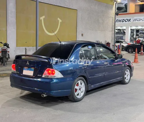 ميتسوبيشي لانسر 2007 أبيض مستعملة للبيع - 2