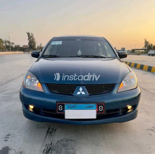 ميتسوبيشي لانسر 2007 أبيض مستعملة للبيع - 5