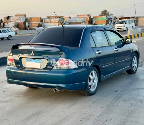 ميتسوبيشي لانسر 2007 أبيض مستعملة للبيع - 6