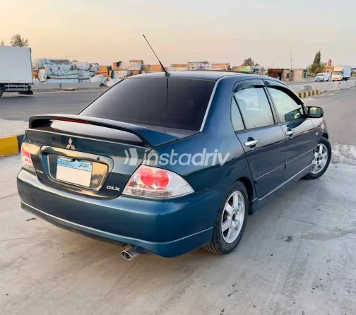 ميتسوبيشي لانسر 2007 أبيض مستعملة للبيع - 8