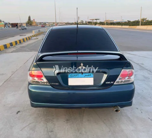 ميتسوبيشي لانسر 2007 أبيض مستعملة للبيع - 9