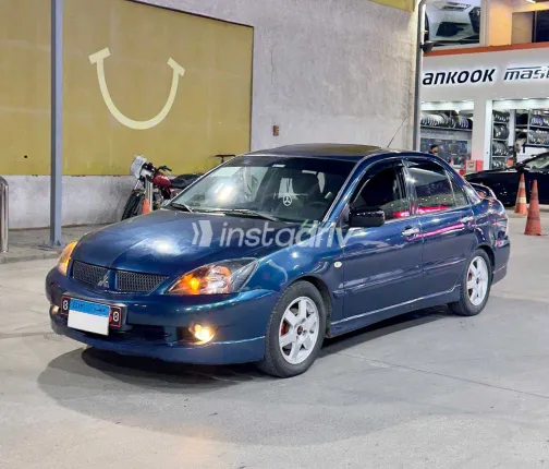 ميتسوبيشي لانسر 2007 أبيض مستعملة للبيع - 10