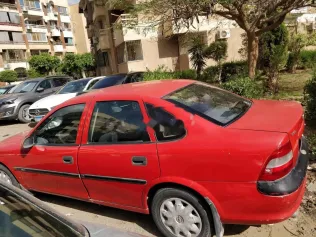 اوبل فيكترا 1997 أحمر مستعملة للبيع