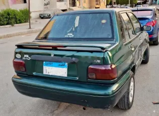 كيا برايد 2001 أخضر غامق مستعملة للبيع