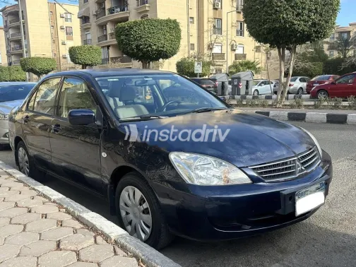 ميتسوبيشي لانسر بومة 2013 أزرق غامق مستعملة للبيع - 3