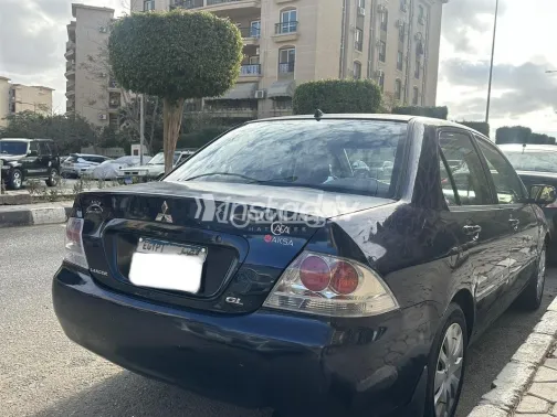 ميتسوبيشي لانسر بومة 2013 أزرق غامق مستعملة للبيع - 4