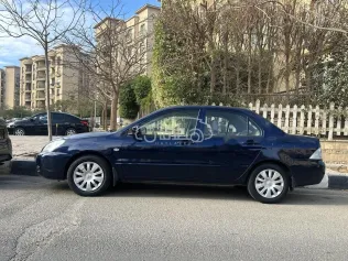 ميتسوبيشي لانسر بومة 2013 أزرق غامق مستعملة للبيع