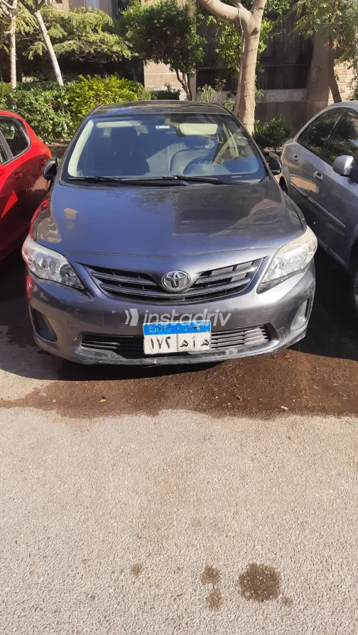 تويوتا كورولا 2013 أبيض مستعملة للبيع - 5