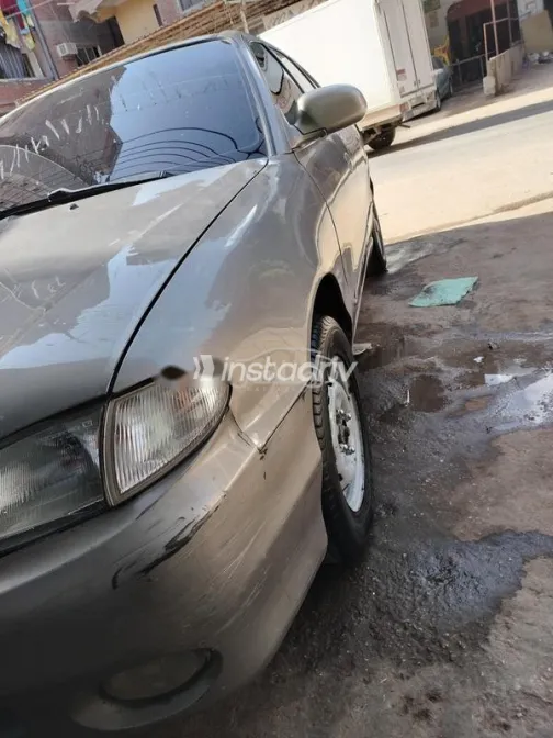 هيونداي اكسنت 1999 ذهبي مستعملة للبيع - 2