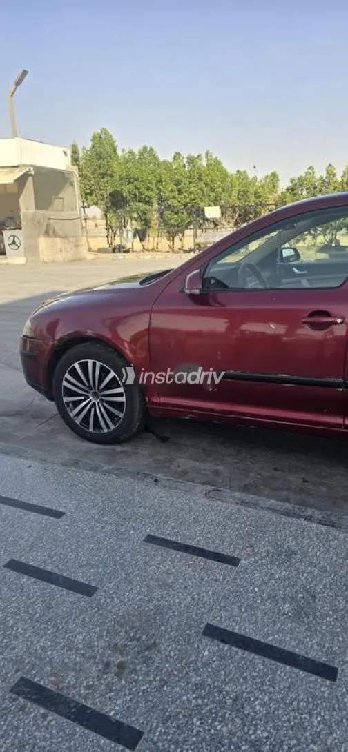 سكودا اوكتافيا A5 2006 أحمر غامق مستعملة للبيع - 1