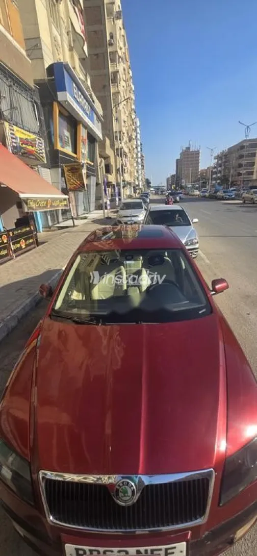 سكودا اوكتافيا A5 2006 أحمر غامق مستعملة للبيع - 9