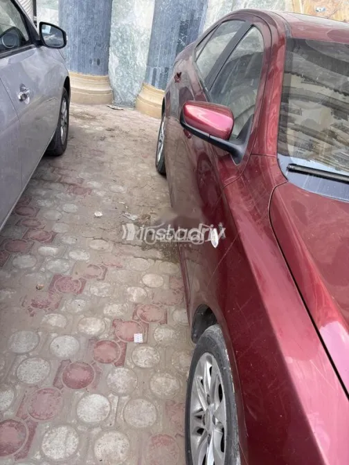 شيفروليه أوبترا 2016 أحمر غامق مستعملة للبيع - 2