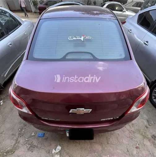 شيفروليه أوبترا 2016 أحمر غامق مستعملة للبيع - 3