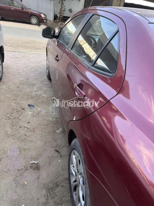 شيفروليه أوبترا 2016 أحمر غامق مستعملة للبيع - 4