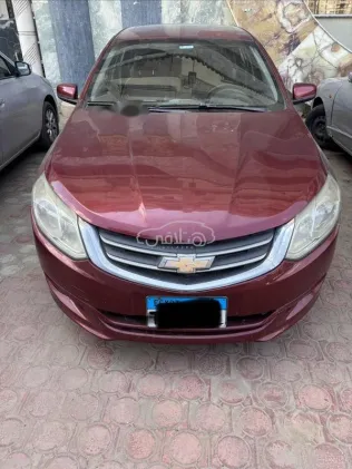 شيفروليه أوبترا 2016 أحمر غامق مستعملة للبيع